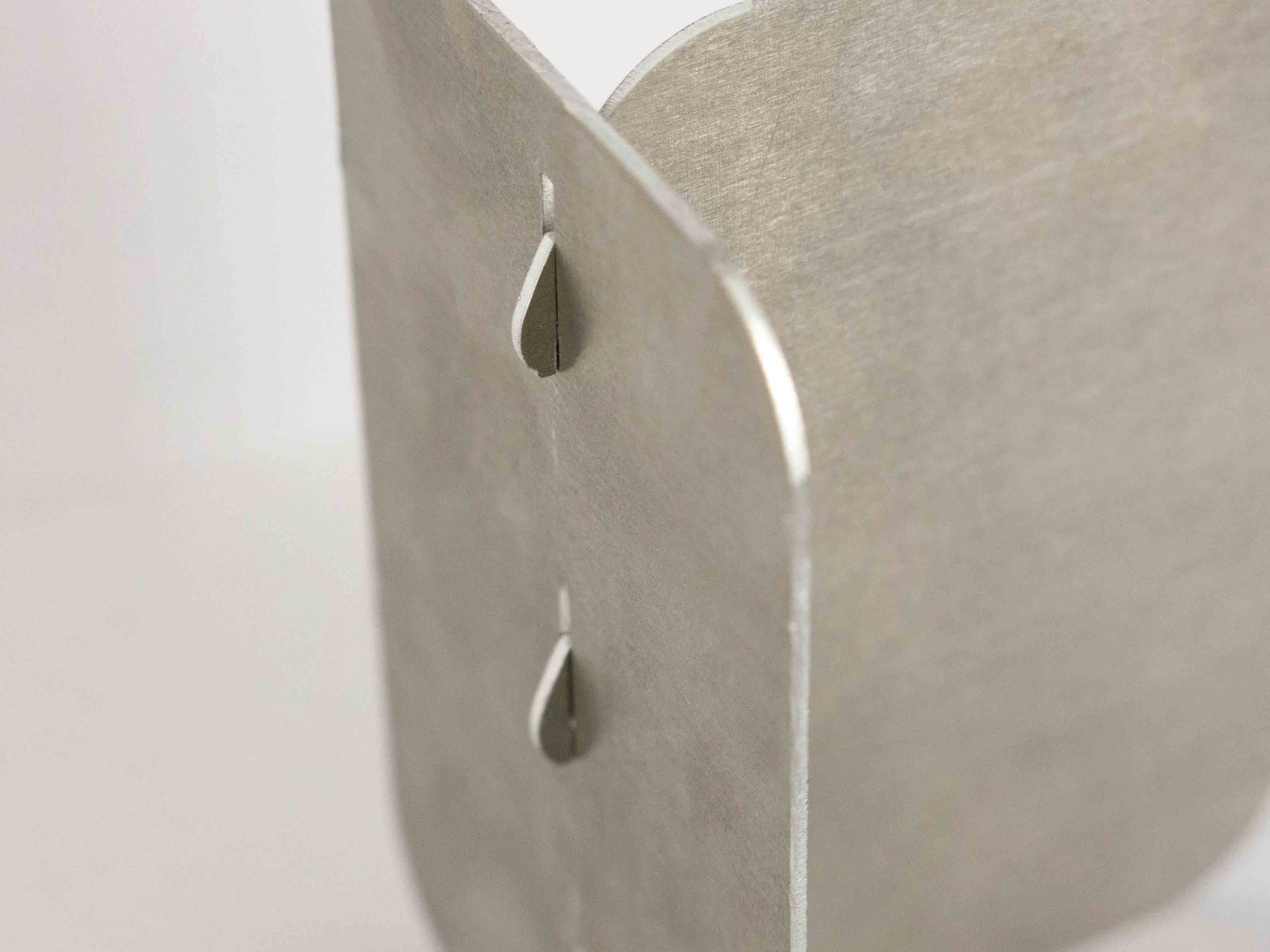 laser cut metal fastening hooks back